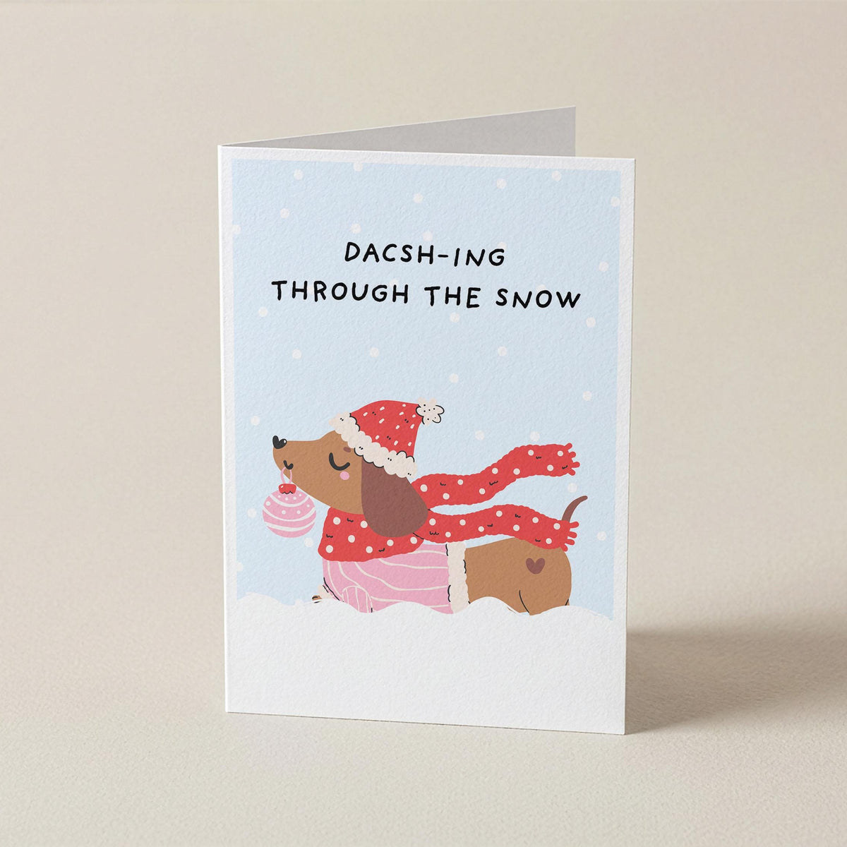 Dacsh-ing Through the Snow